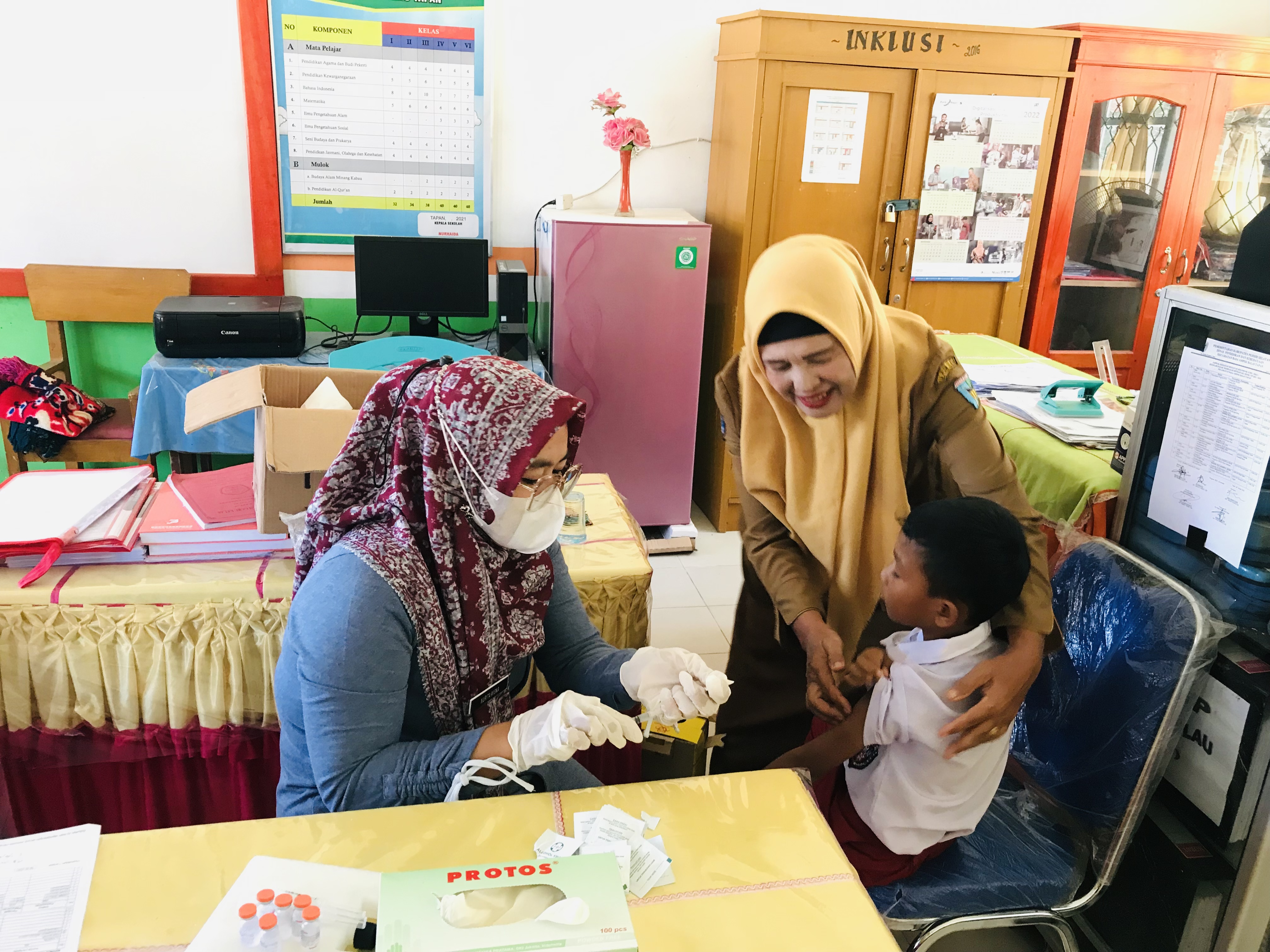 Pelaksaan Vaksinasi lanjutan Di UPT SD N 08 Pasar.60 dan UPT SD N 09 Nilau