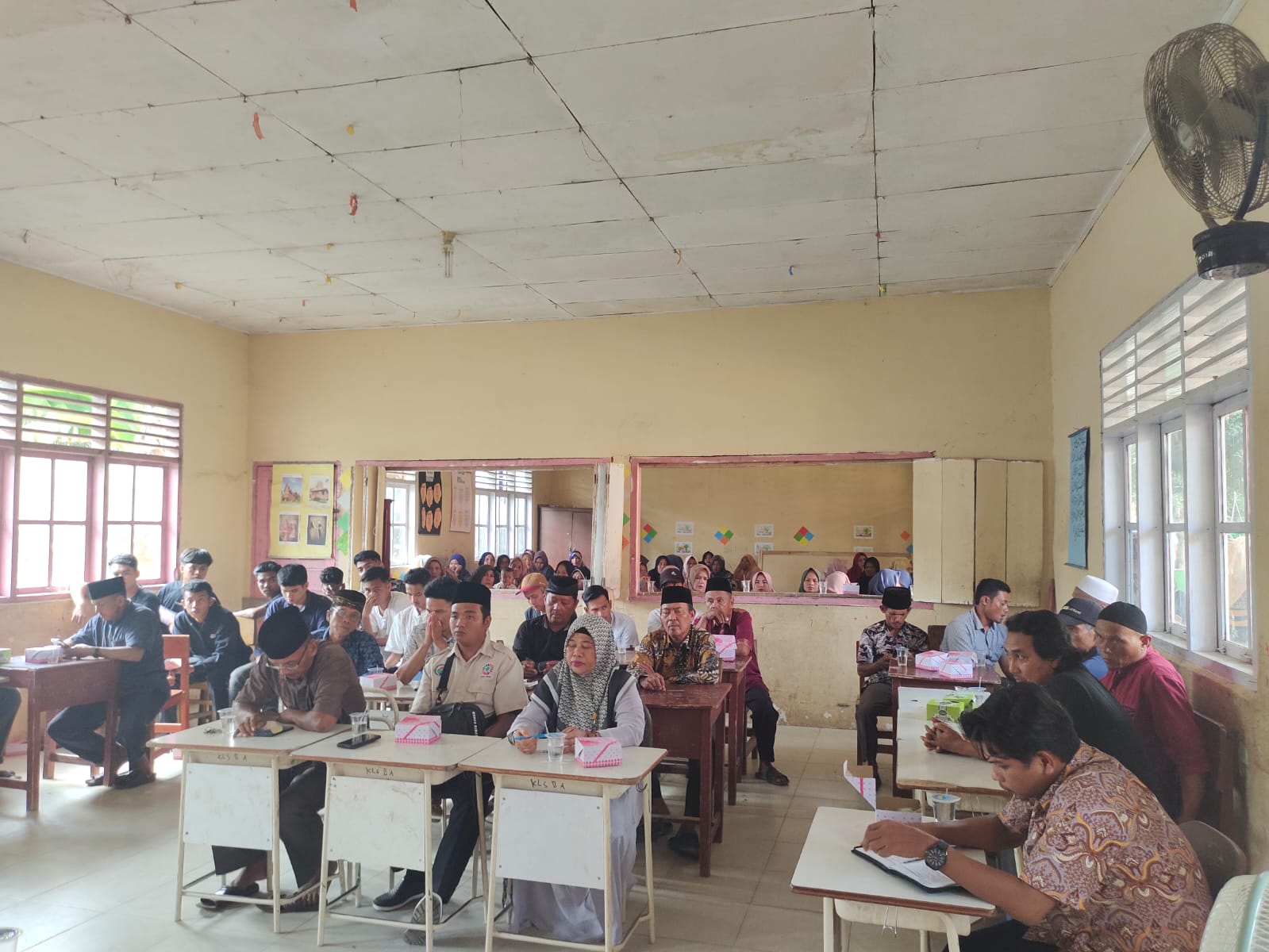 Camat Basa Ampek Balai Tapan Menghadiri Pilbamus Nagari Koto Anau Tapan