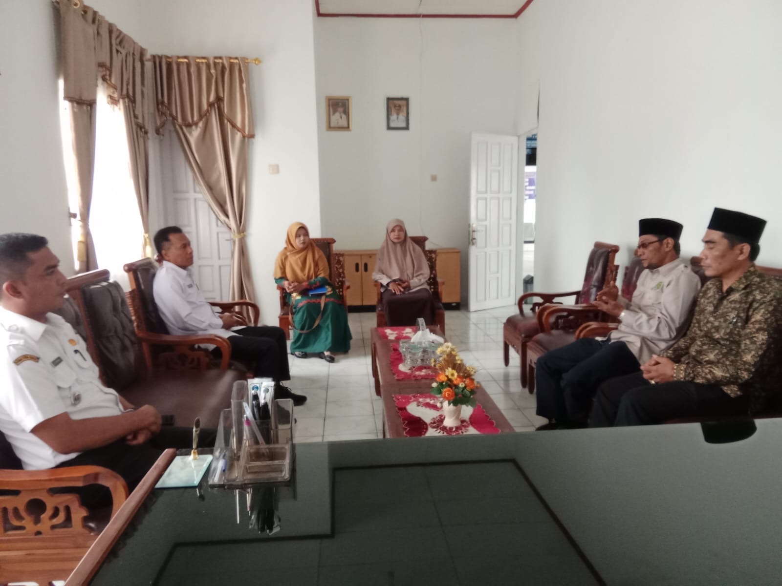 Camat Basa Ampek Balai Tapan bersama KUA Basa Ampek Balai Tapan melakukan Rapat Koordinasi terkait r