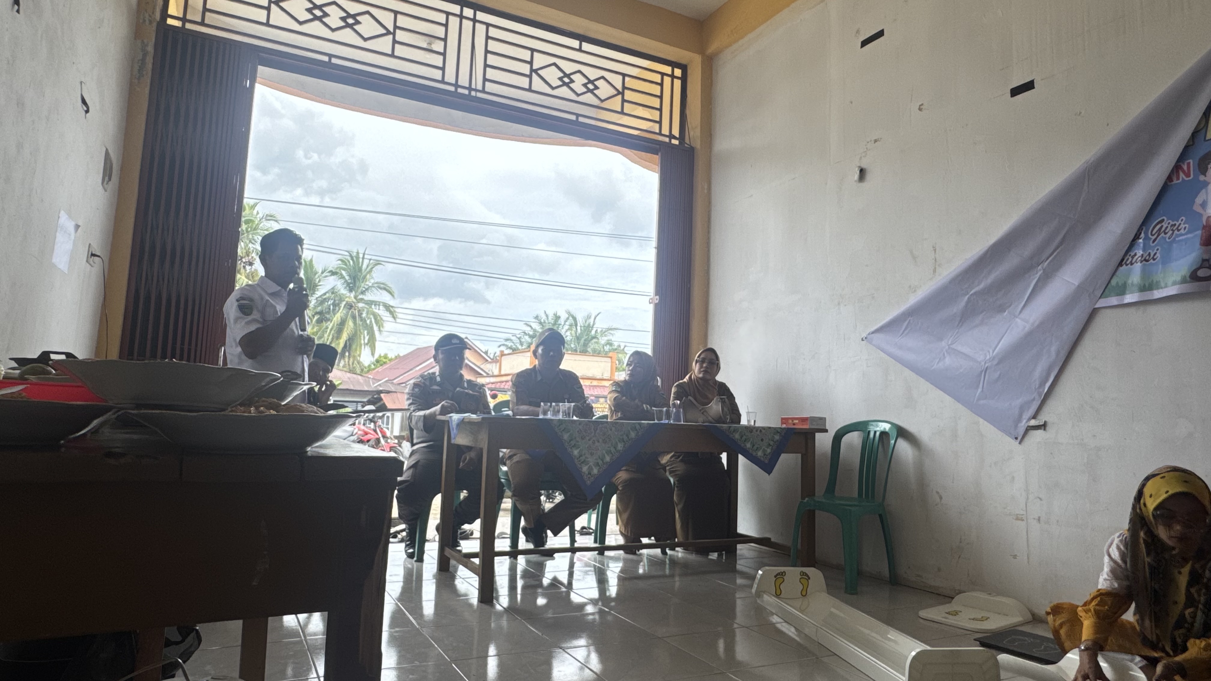 Kasi Kessos Kecamatan Basa Ampek Balai Tapan Hadiri Acara Pos Gizi di Nagari Koto Anau Tapan